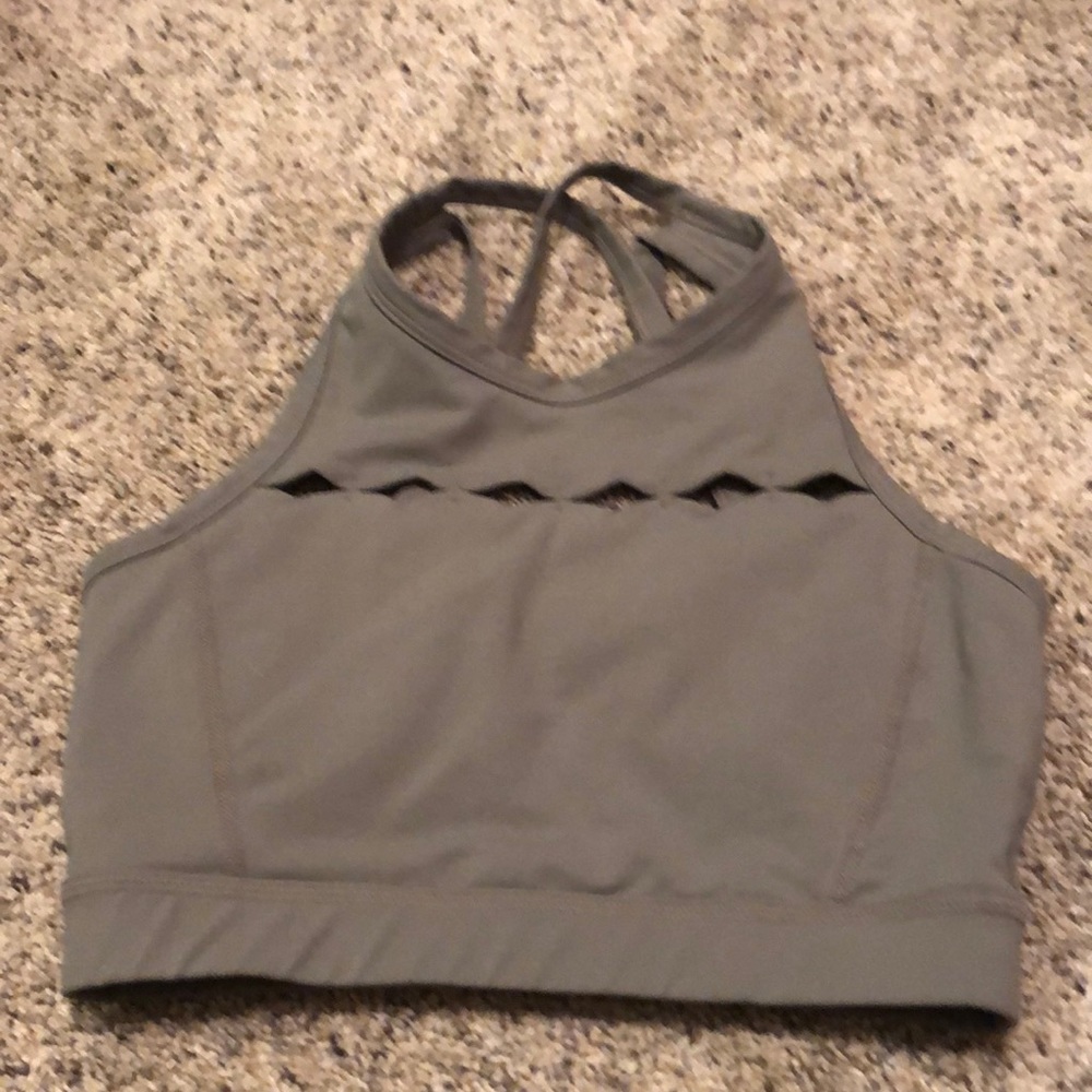 Sports bra with adorable detailing and removable pads.